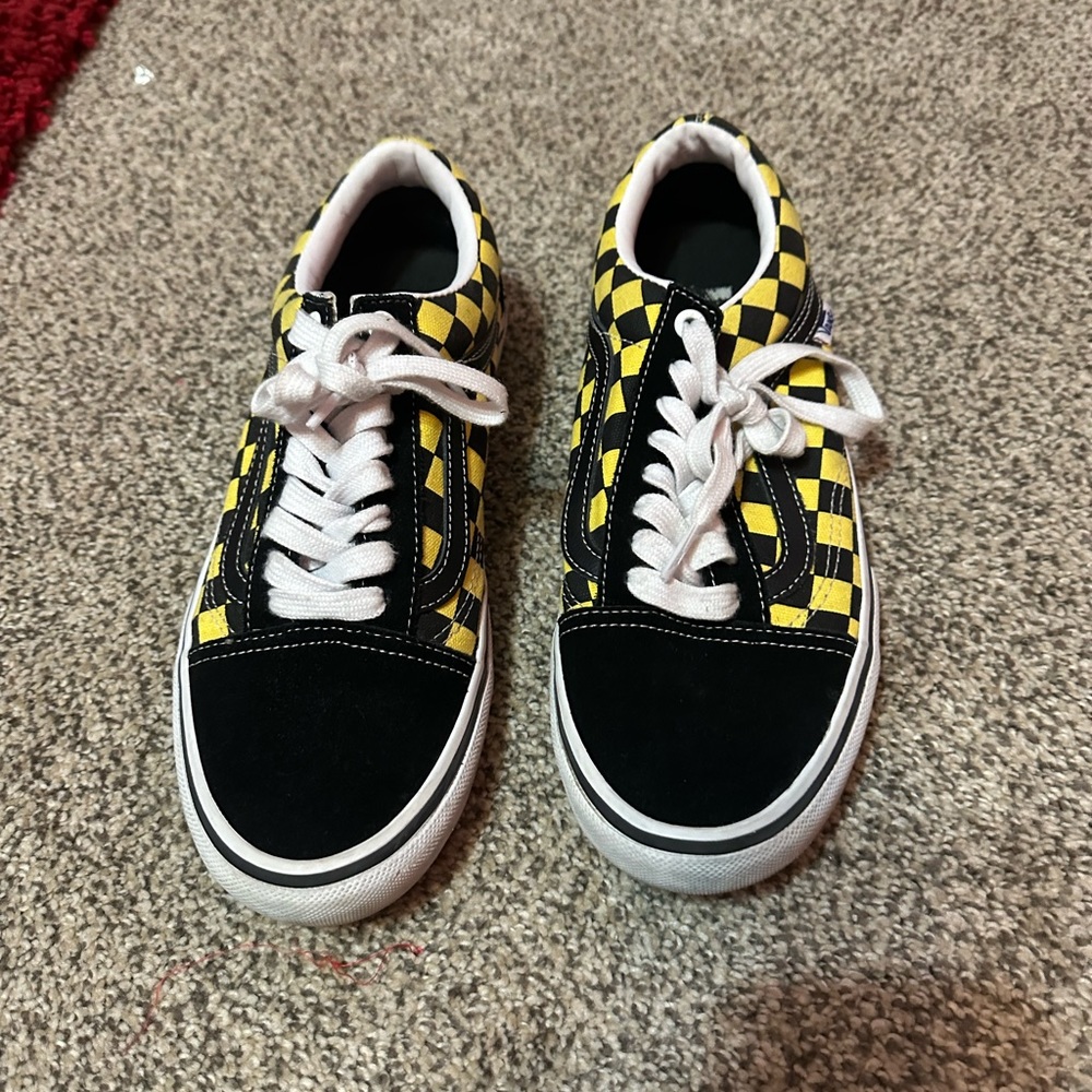 black, yellow, checkerboard vans.